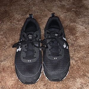 Selling a pair of black size 12 under armor sneakers.